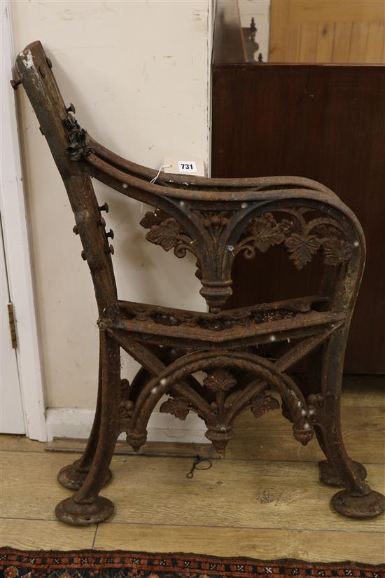 A pair of cast iron bench ends W.63cm